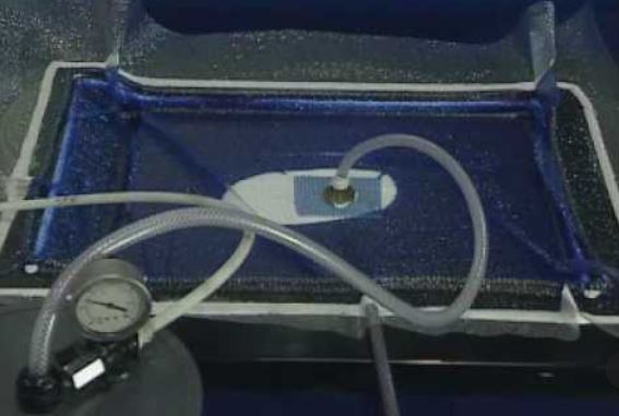 Vacuum injection molding